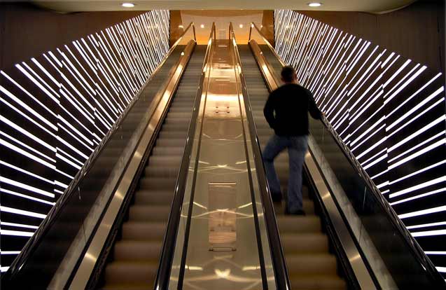 Backlit 3form and Wood Escalator Feature Walls