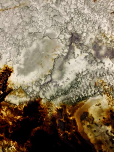 Backlit Onyx Textures with Blue Gold Clouds