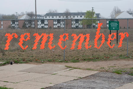 Remember This Fence Art Installation Woven and Cross Stitched Letters